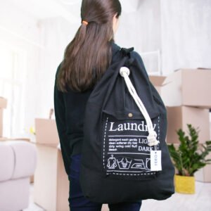 Canvas laundry bag with shoulder online strap